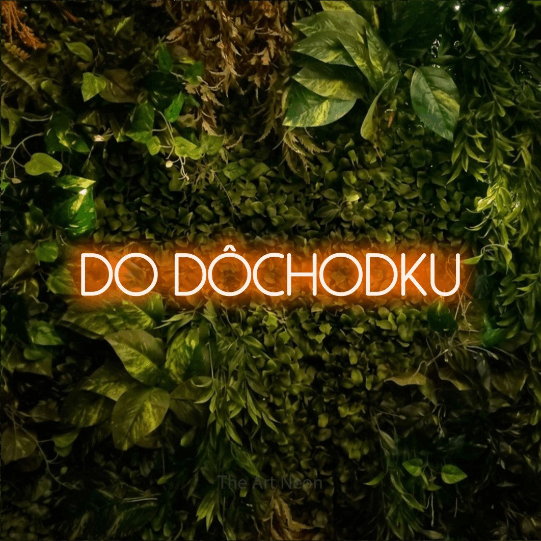 LED neon sign reading “DO DÔCHODKU”, arranged in a single line.