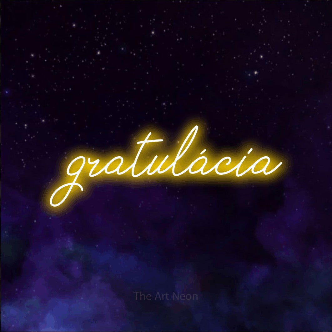 LED neon sign reading “gratulácia”, arranged in a single line.