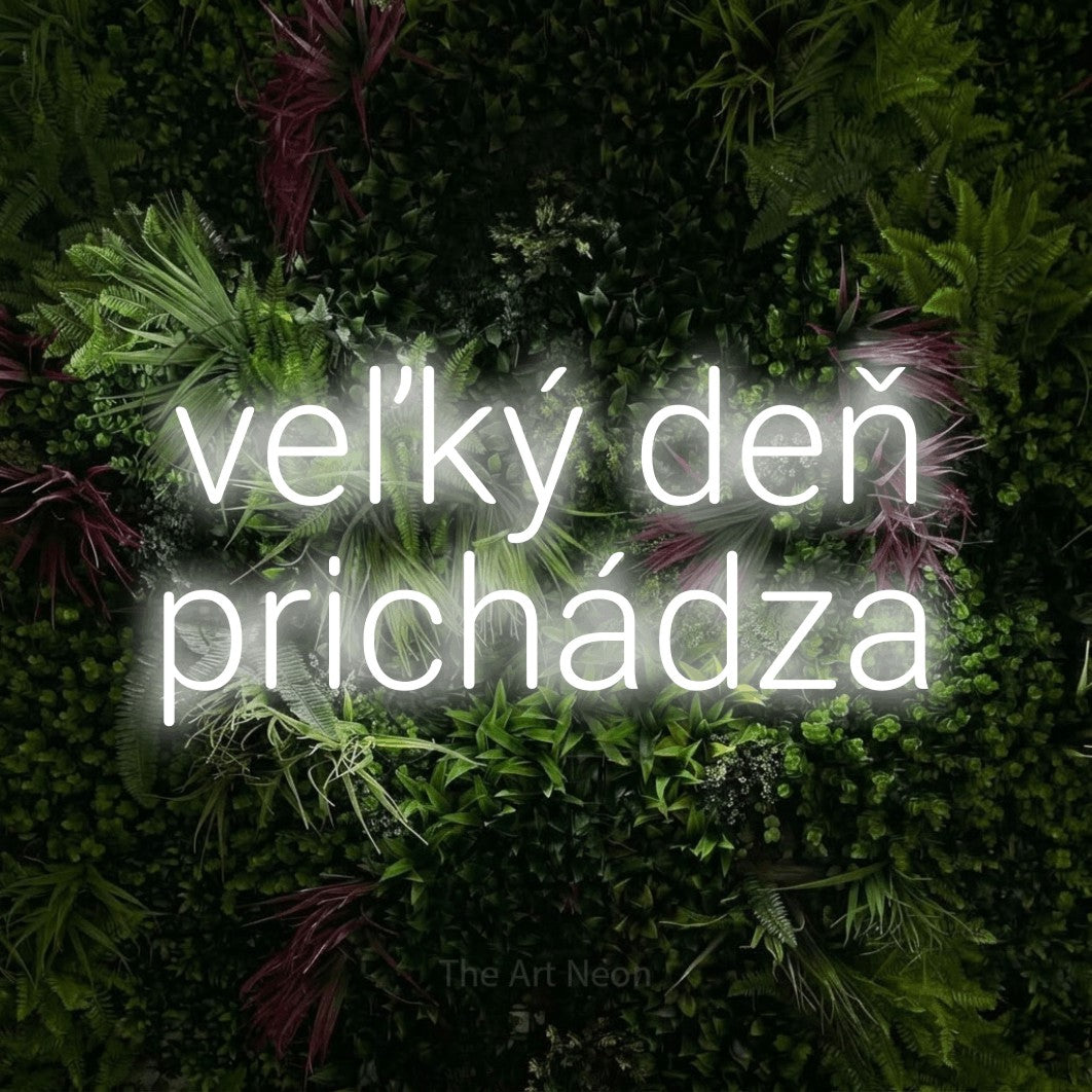 LED neon sign reading “veľký deň prichádza”, arranged in two lines.