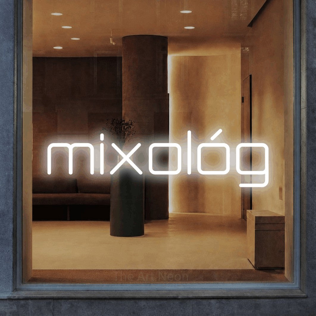LED neon sign reading “mixológ”, arranged in a single line.