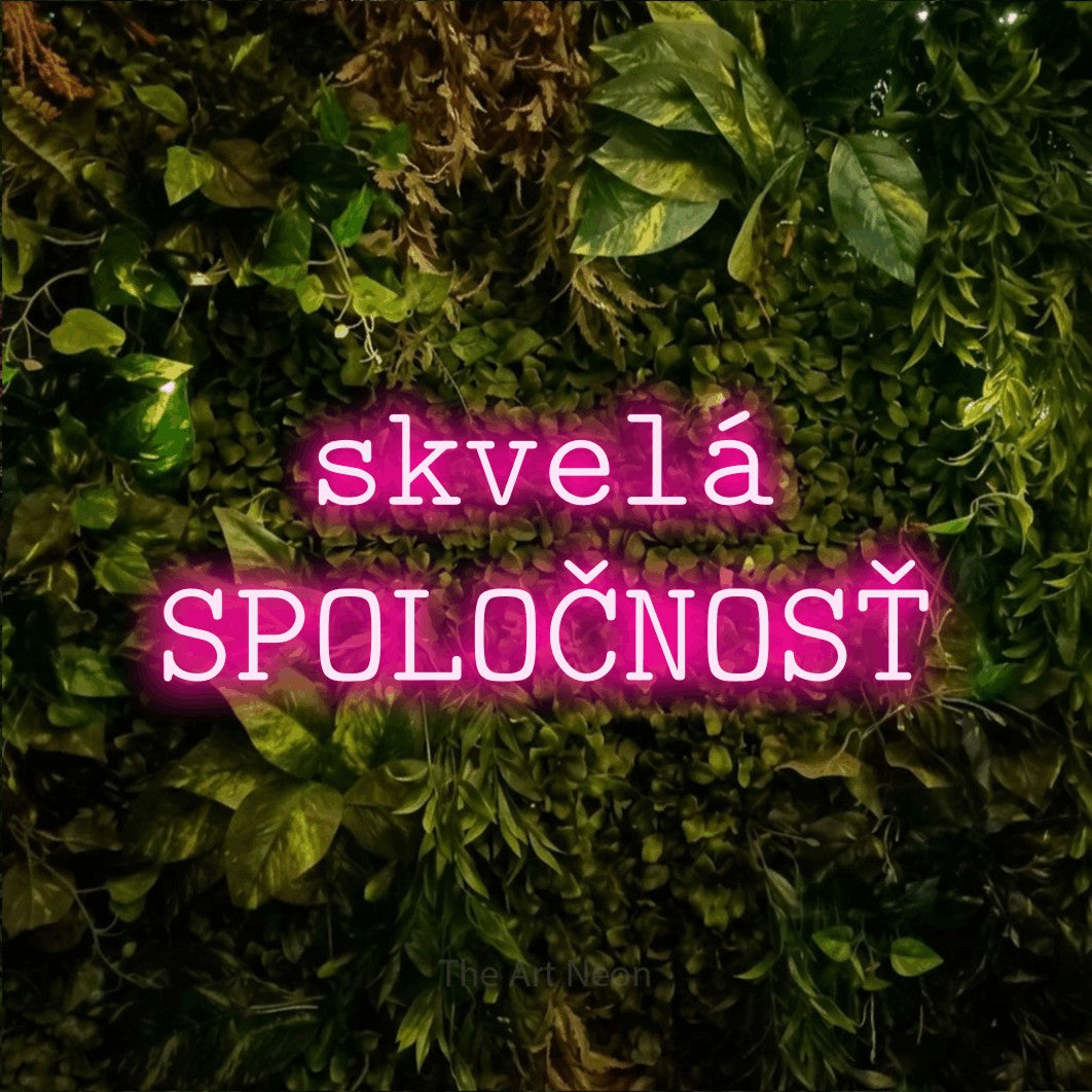 LED neon sign reading “skvelá SPOLOČNOSŤ”, arranged in two lines.
