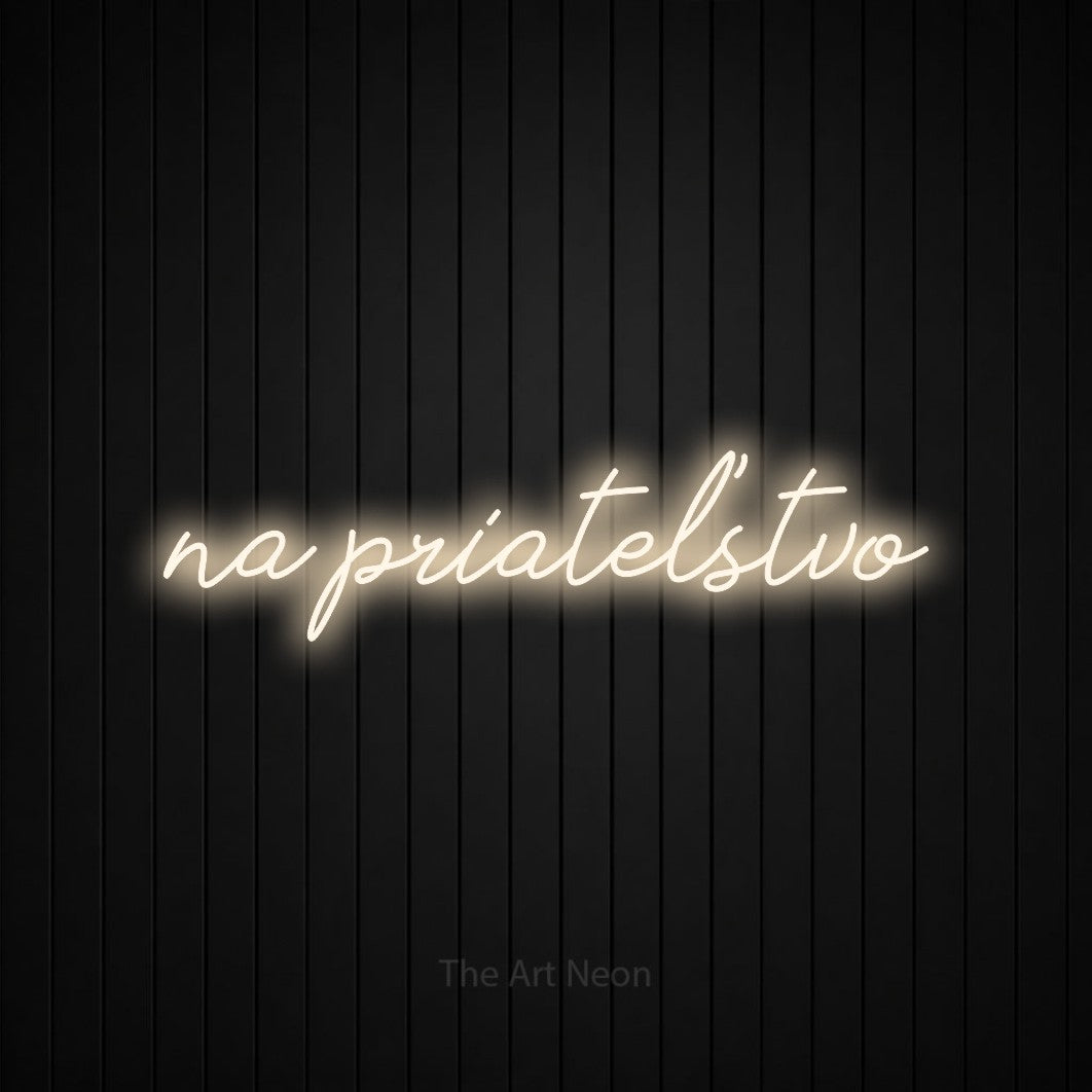 LED neon sign reading “na priateľstvo”, arranged in a single line.