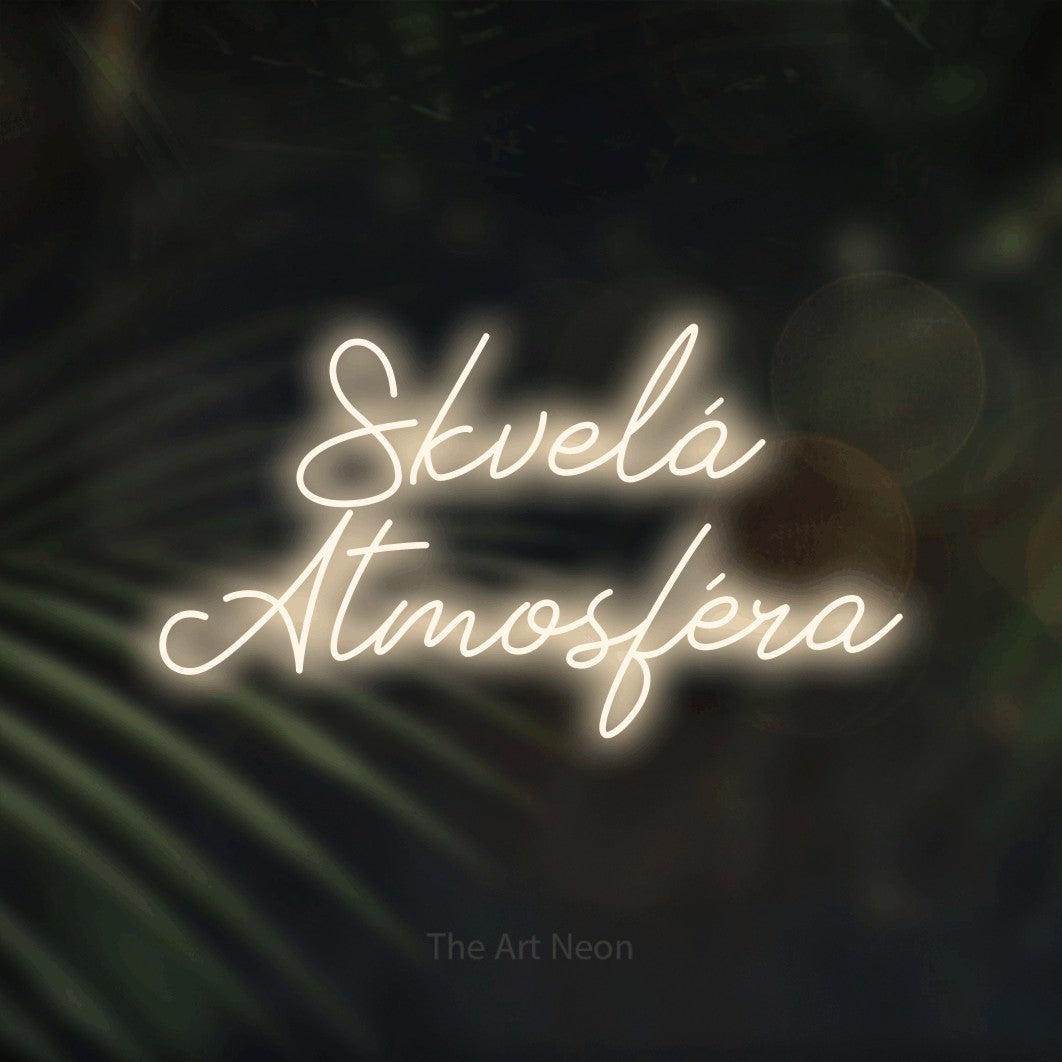 LED neon sign reading “Skvelá Atmosféra”, arranged in two lines.