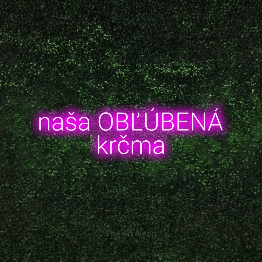 LED neon sign reading “naša OBĽÚBENÁ krčma”, arranged in two lines.