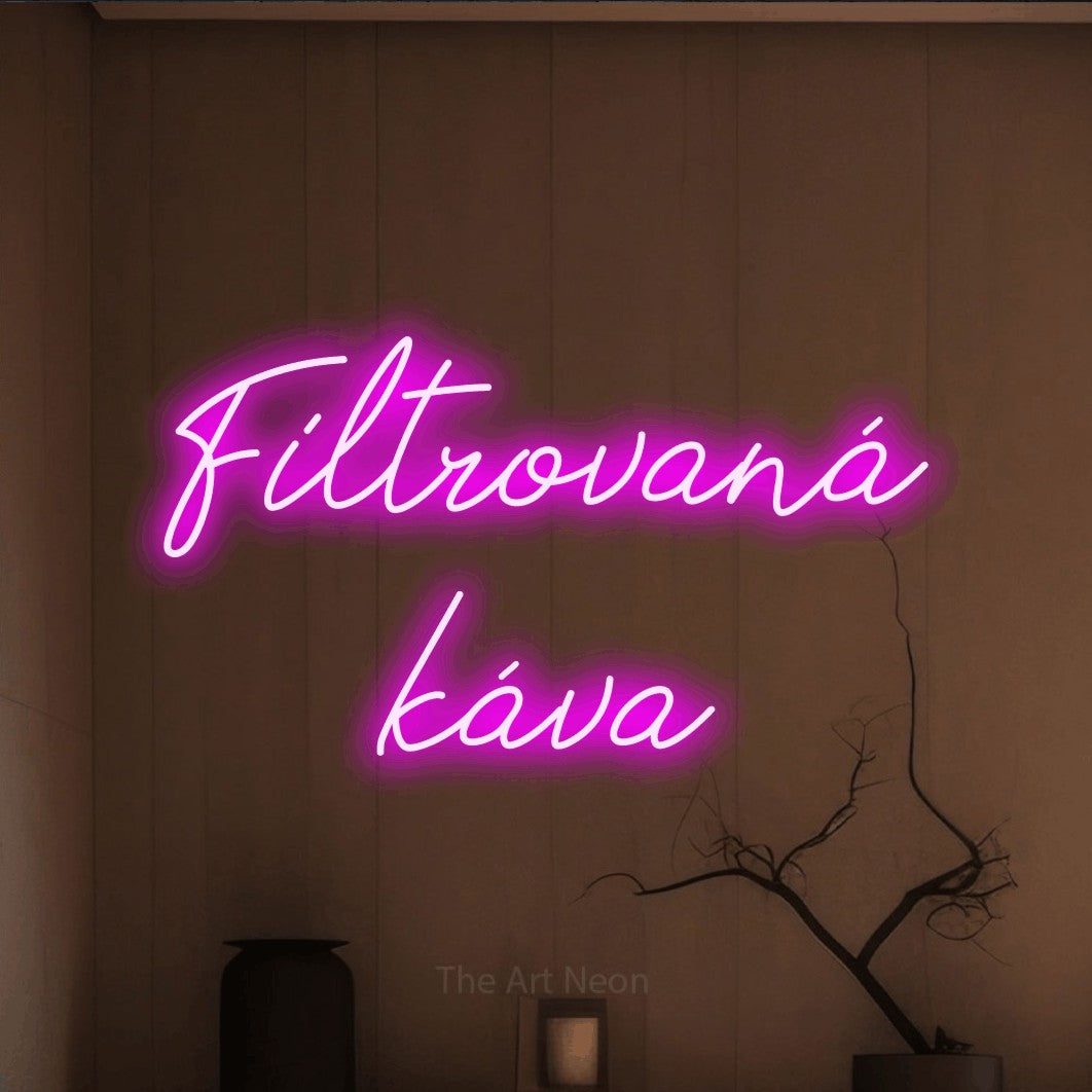 LED neon sign reading “Filtrovaná káva”, arranged in two lines.