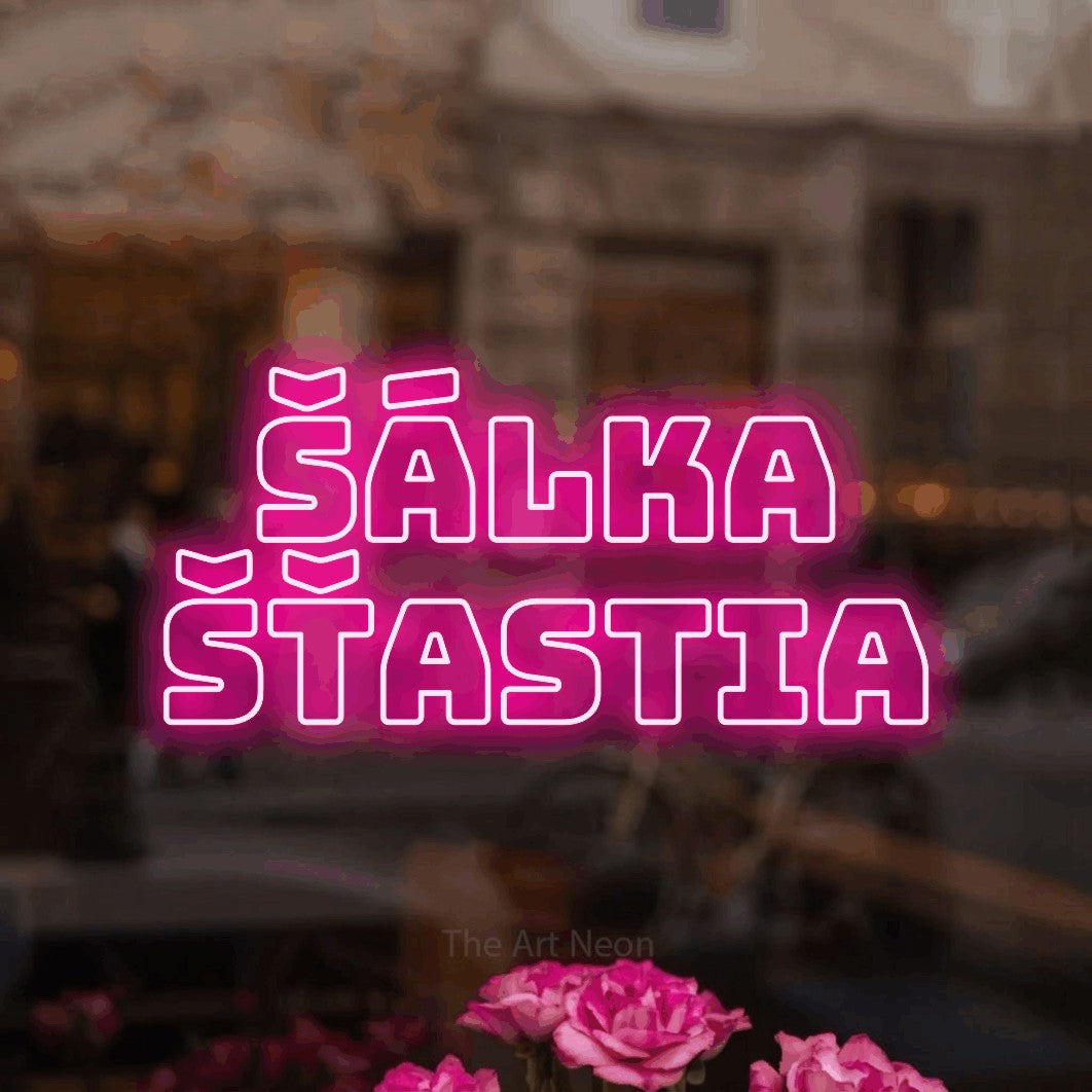 LED neon sign reading “Šálka Šťastia”, arranged in two lines.