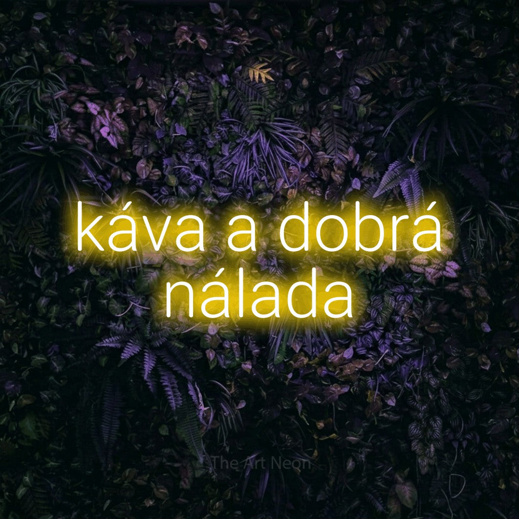 LED neon sign reading “káva a dobrá nálada”, arranged in two lines.