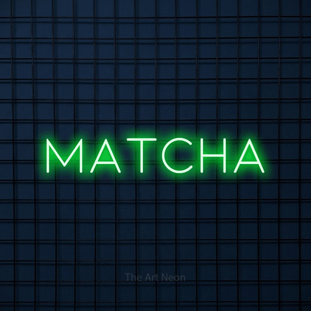 LED neon sign reading “Matcha”, arranged in a single line.