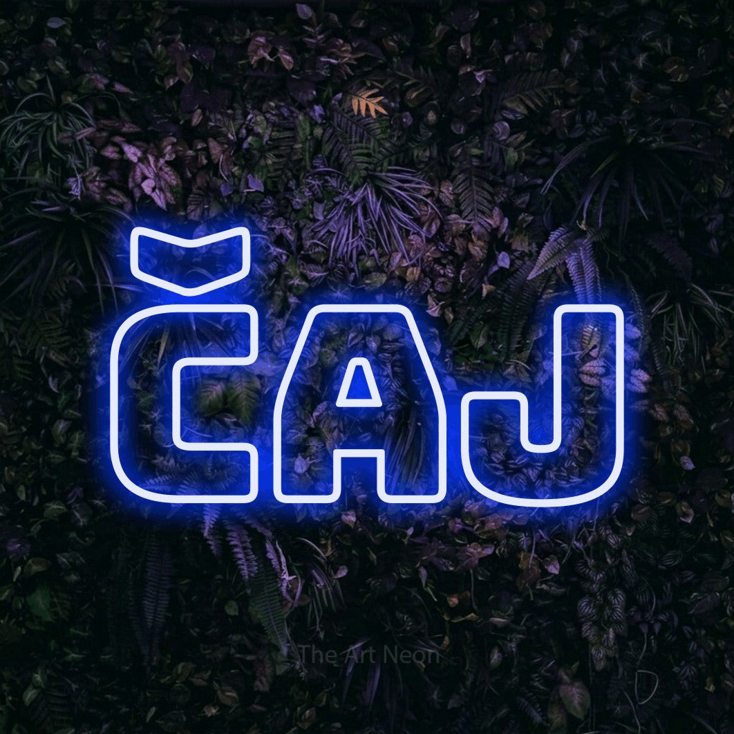LED neon sign reading “ČAJ”, arranged in a single line.