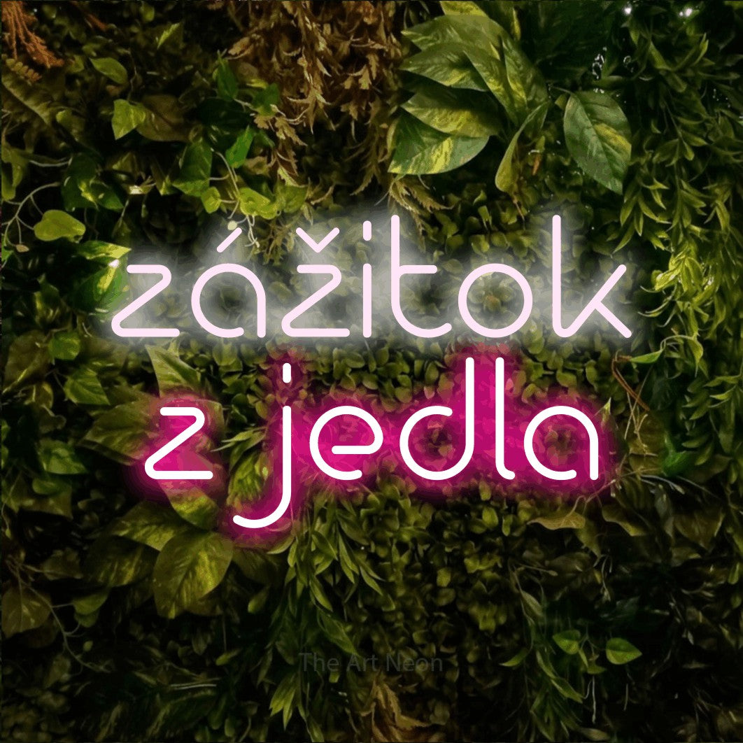 LED neon sign reading “zážitok z jedla”, arranged in two lines.