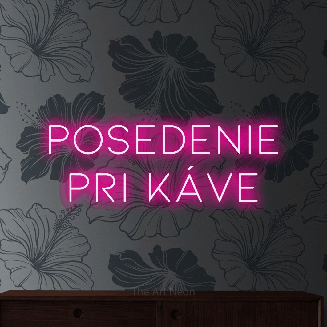 LED neon sign reading “Posedenie pri Káve”, arranged in two lines.