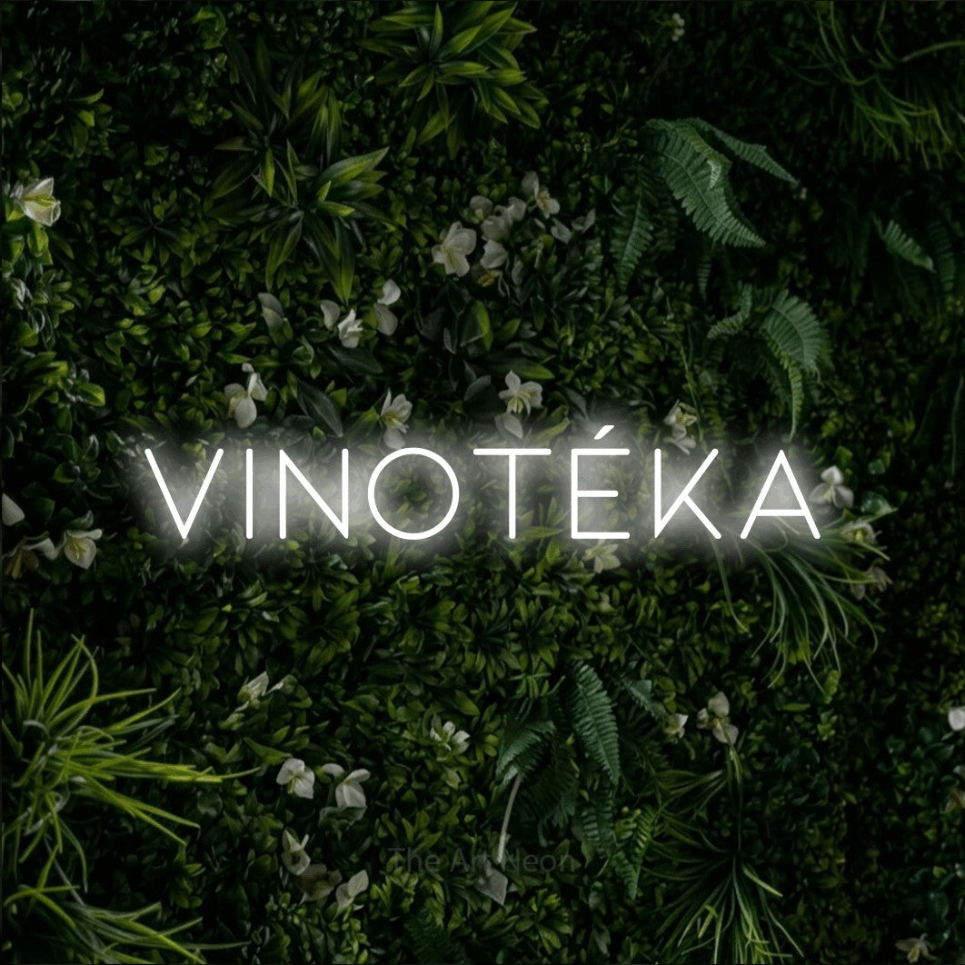 LED neon sign reading “VINOTÉKA”, arranged in a single line.