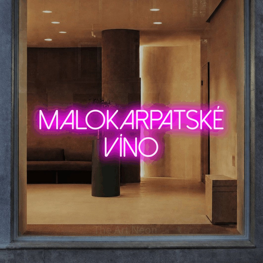 LED neon sign reading “MALOKARPATSKÉ VÍNO”, arranged in two lines.
