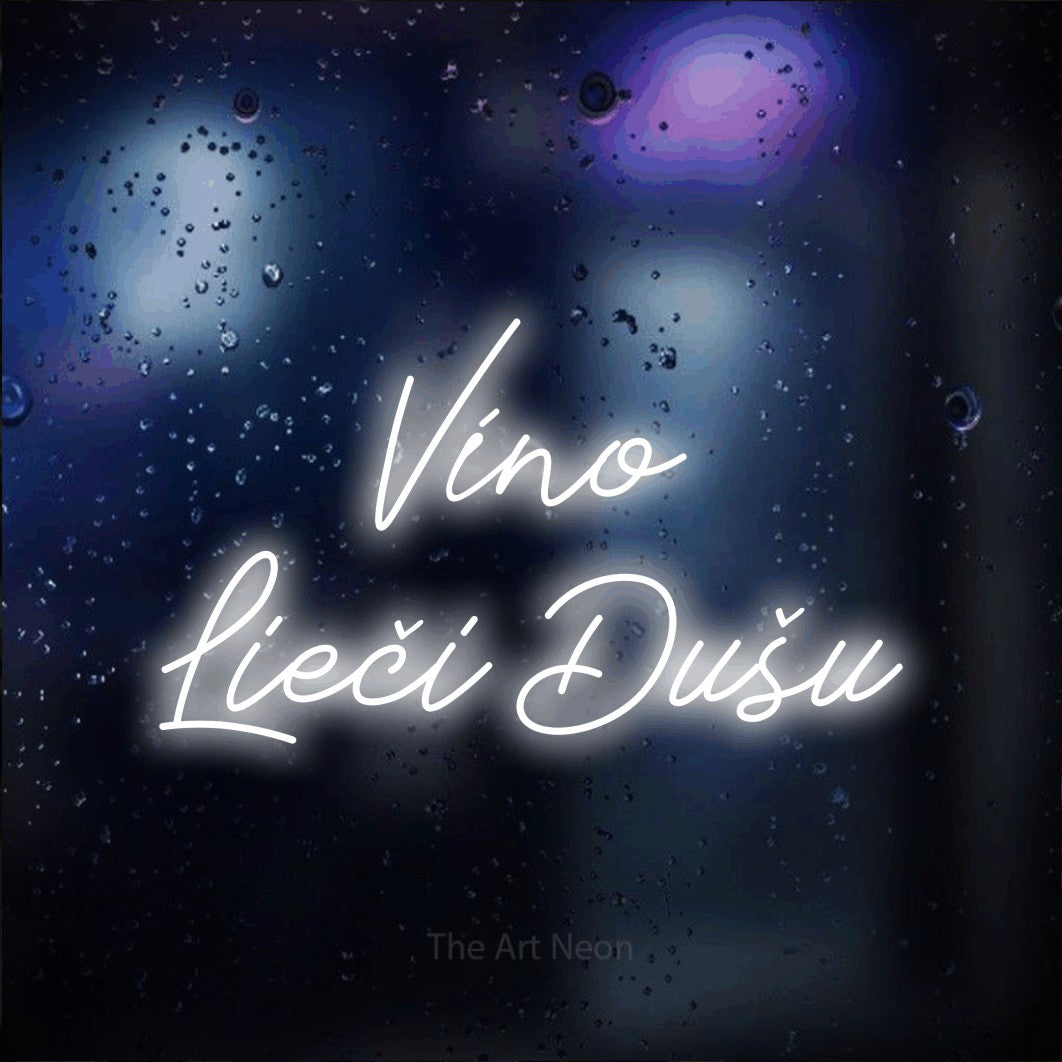 LED neon sign reading “Víno Lieči Dušu”, arranged in two lines.