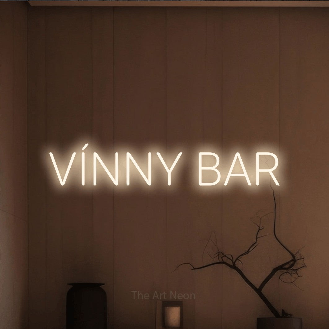 LED neon sign reading “VÍNNY BAR”, arranged in a single line.