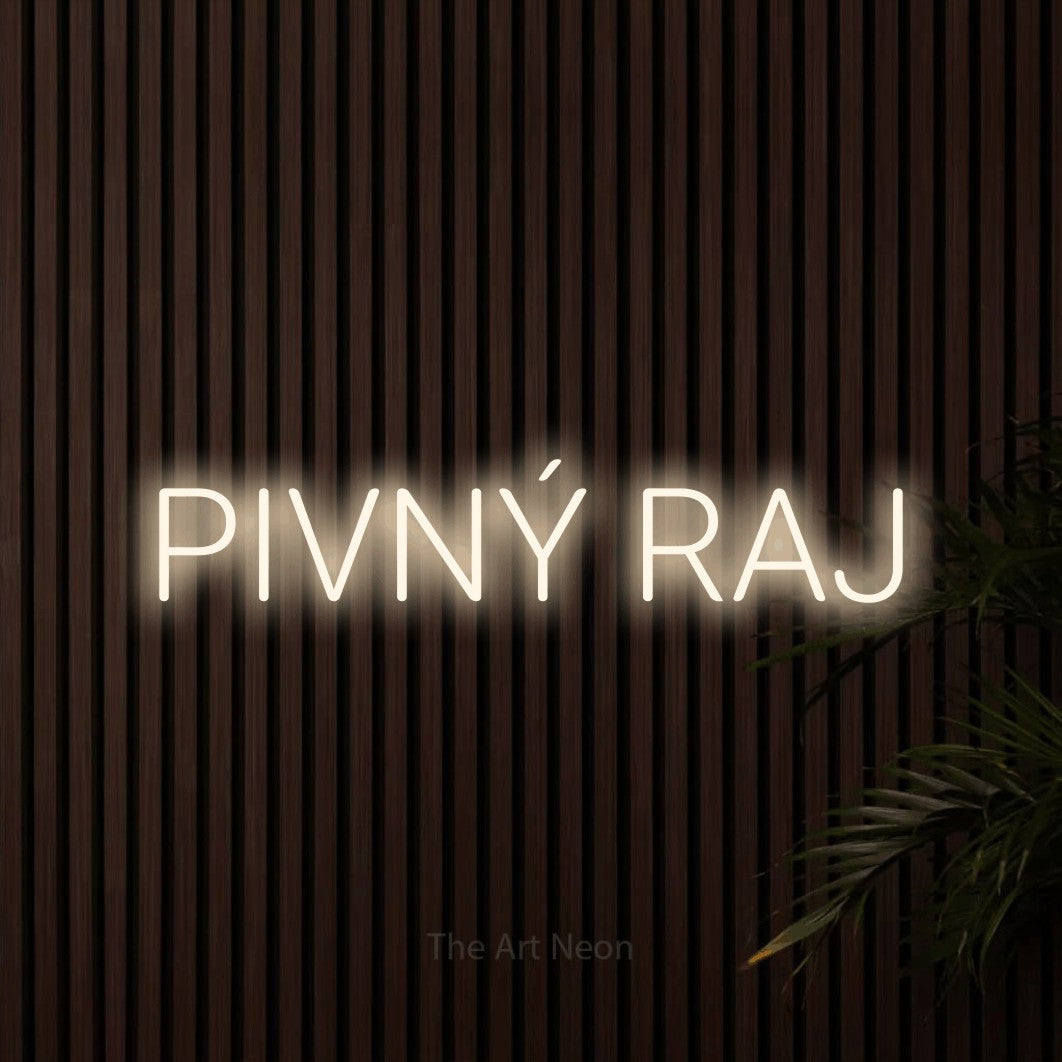 LED neon sign reading “PIVNÝ RAJ”, arranged in a single line.