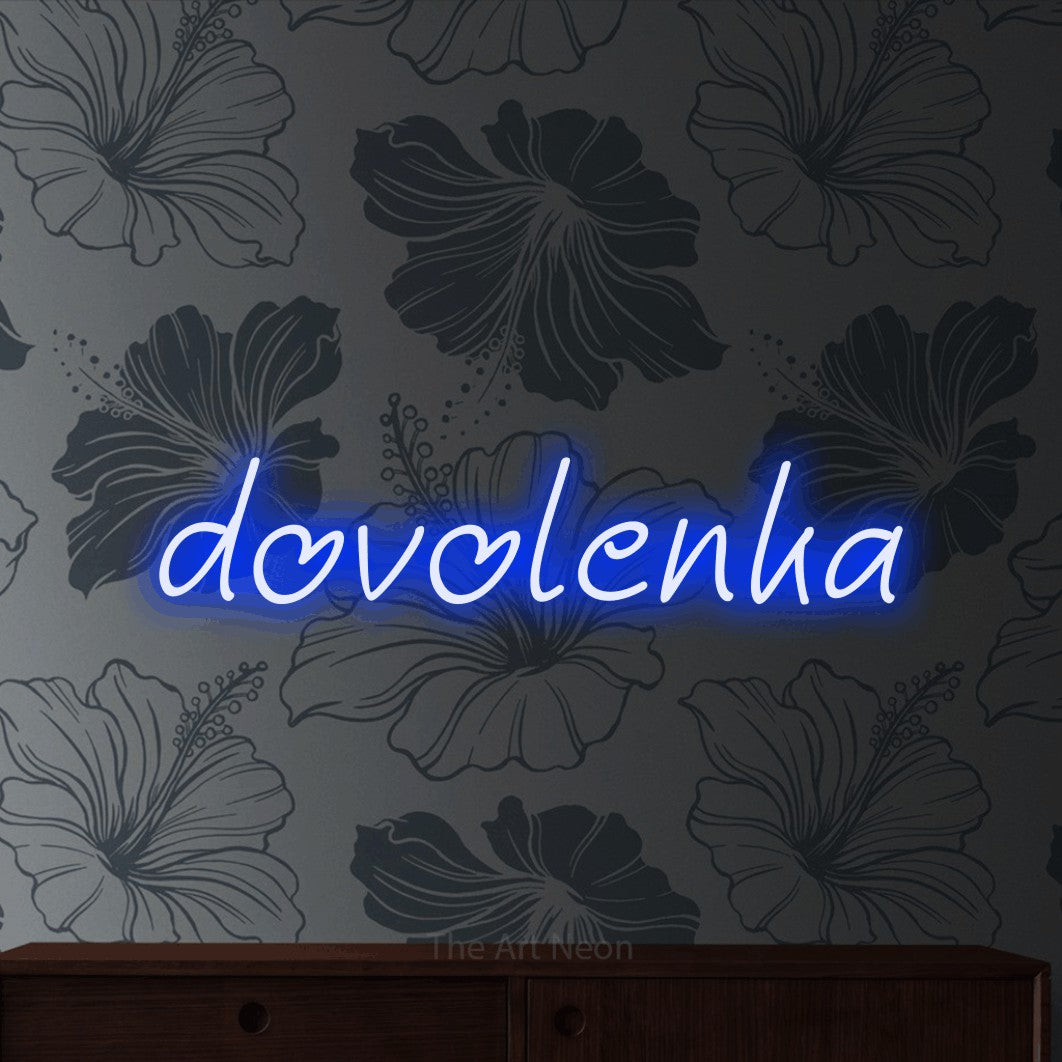 LED neon sign reading “dovolenka”, arranged in a single line.