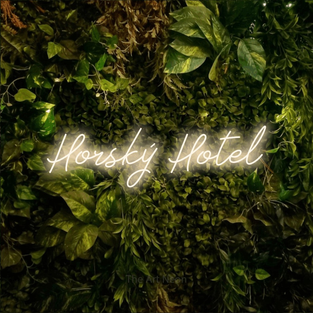 LED neon sign reading “Horský Hotel”, arranged in a single line.