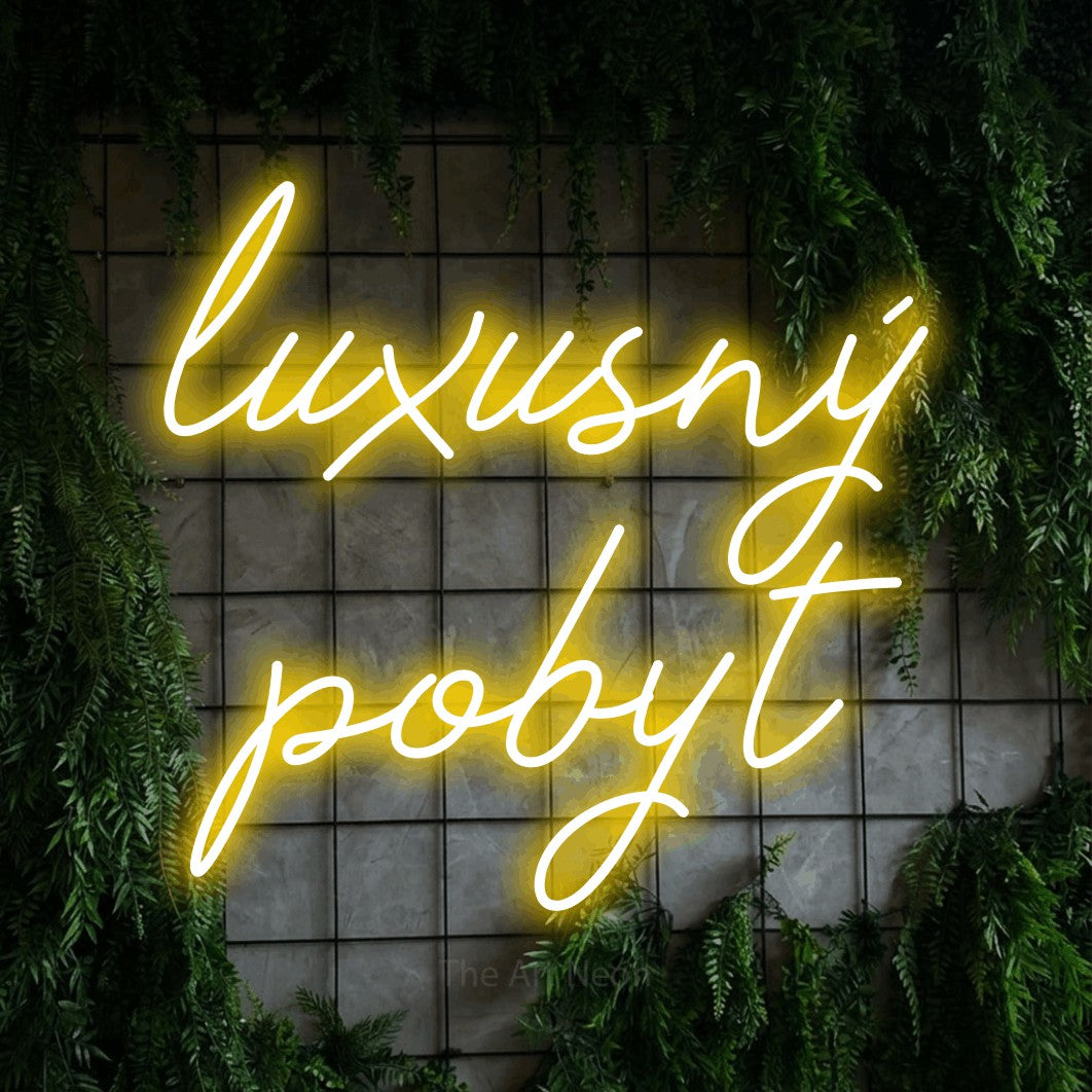 LED neon sign reading “luxusný pobyt”, arranged in two lines.
