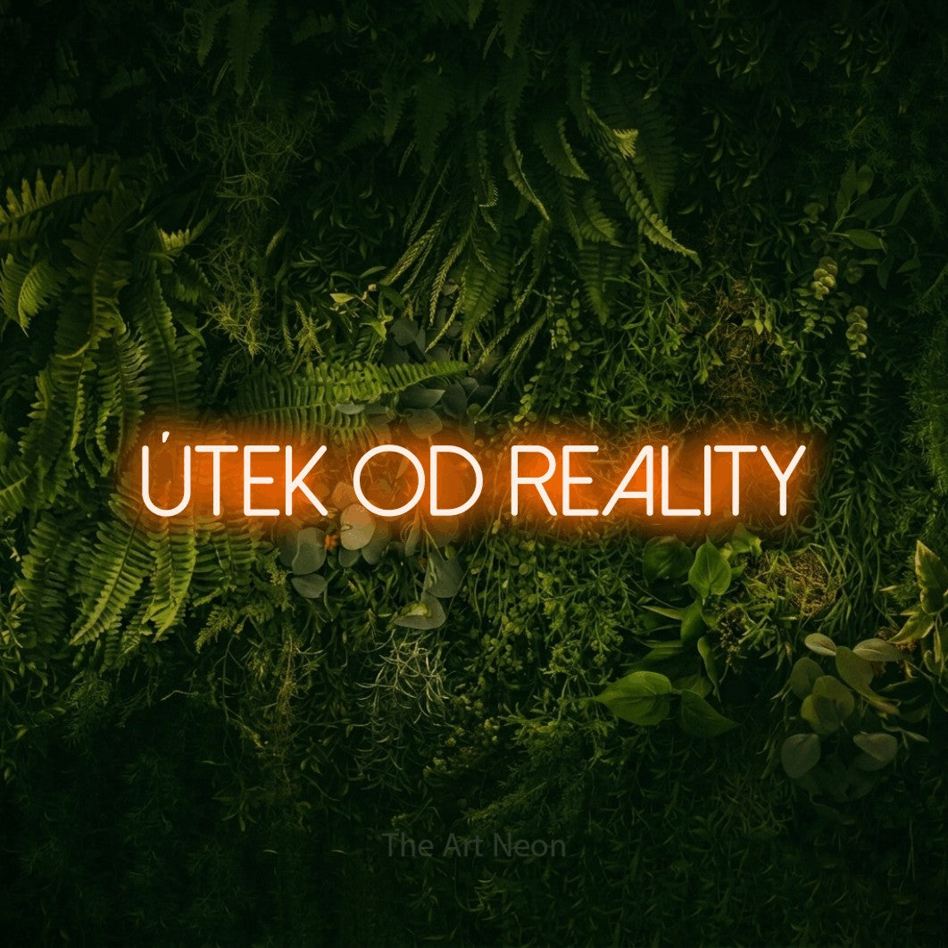 LED neon sign reading “Útek od Reality”, arranged in a single line.