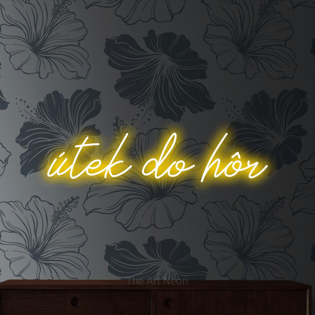 LED neon sign reading “útek do hôr”, arranged in a single line.