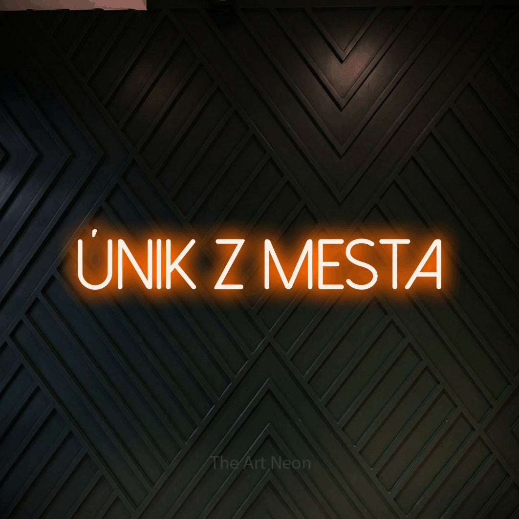 LED neon sign reading “Únik z Mesta”, arranged in a single line.