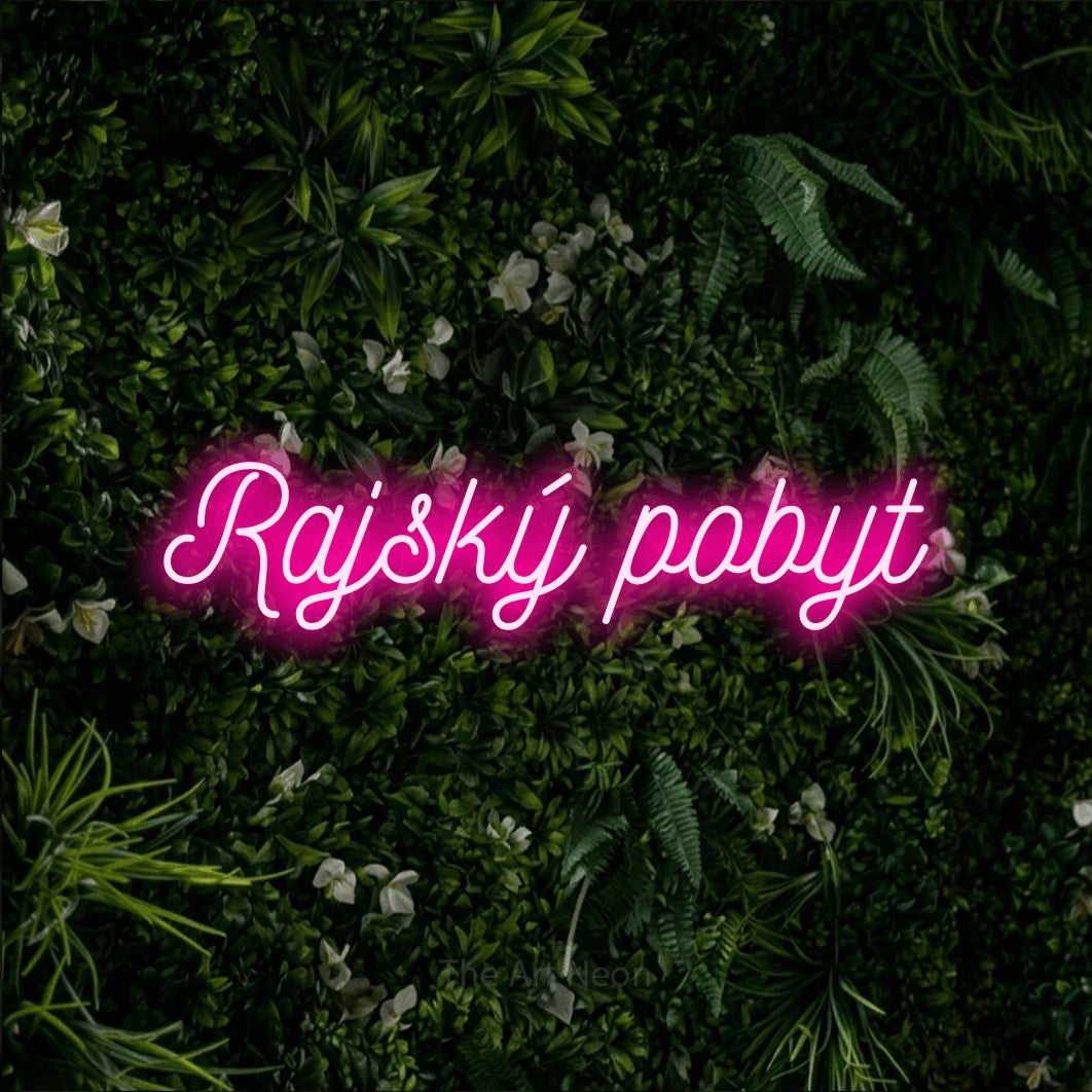 LED neon sign reading “Rajský pobyt”, arranged in a single line.