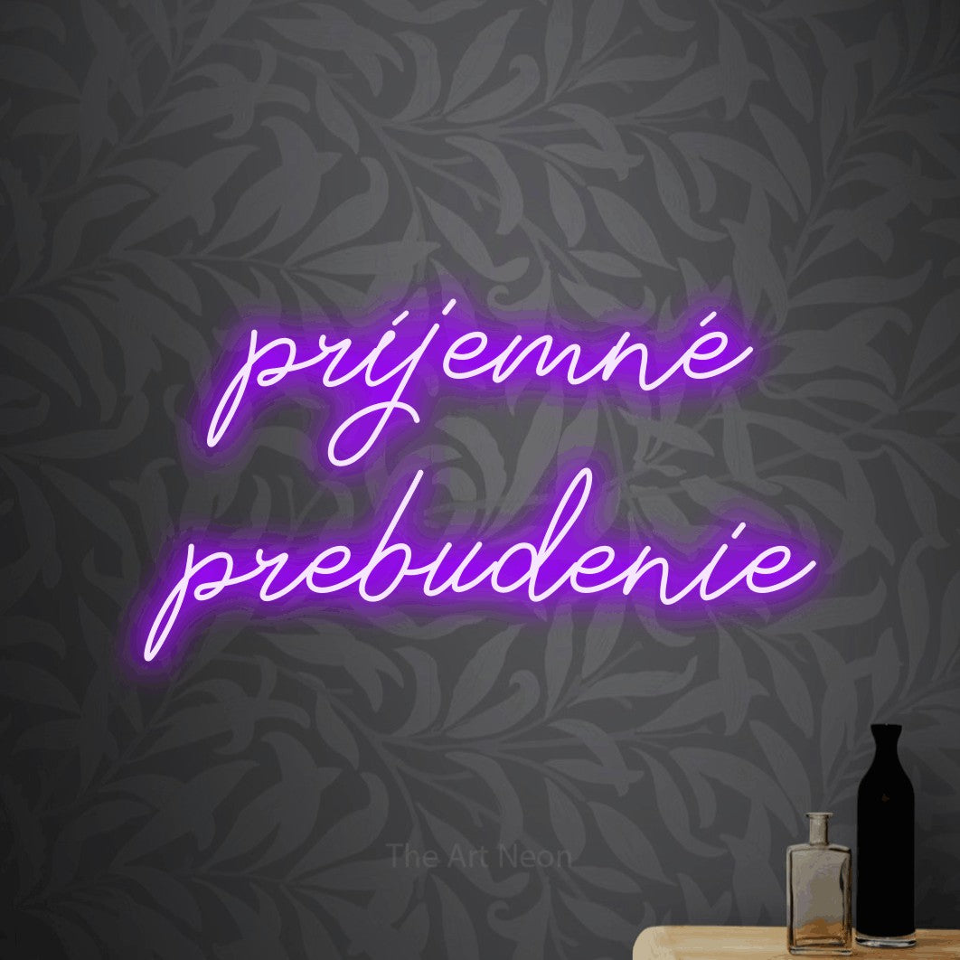 LED neon sign reading “príjemné prebudenie”, arranged in two lines.