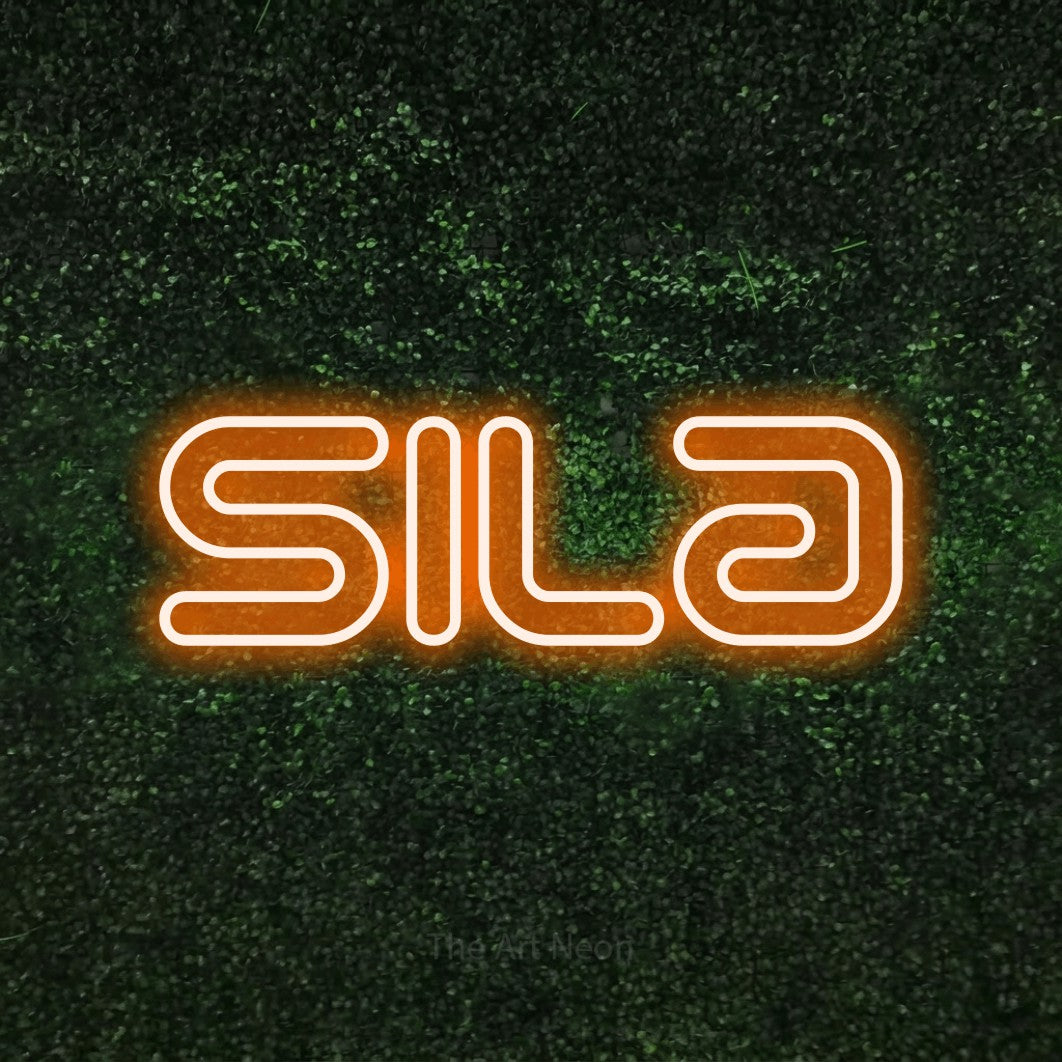 LED neon sign reading “Sila”, arranged in a single line.