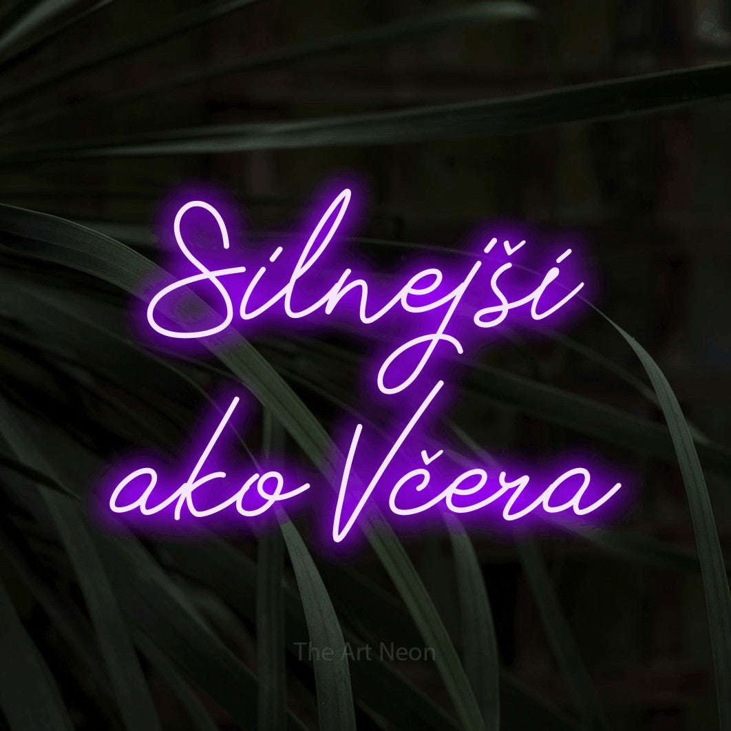 LED neon sign reading “Silnejší ako Včera”, arranged in two lines.