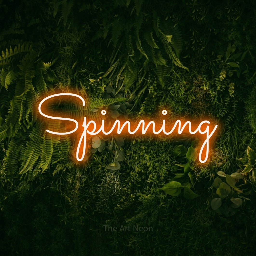 LED neon sign reading “Spinning”, arranged in a single line.