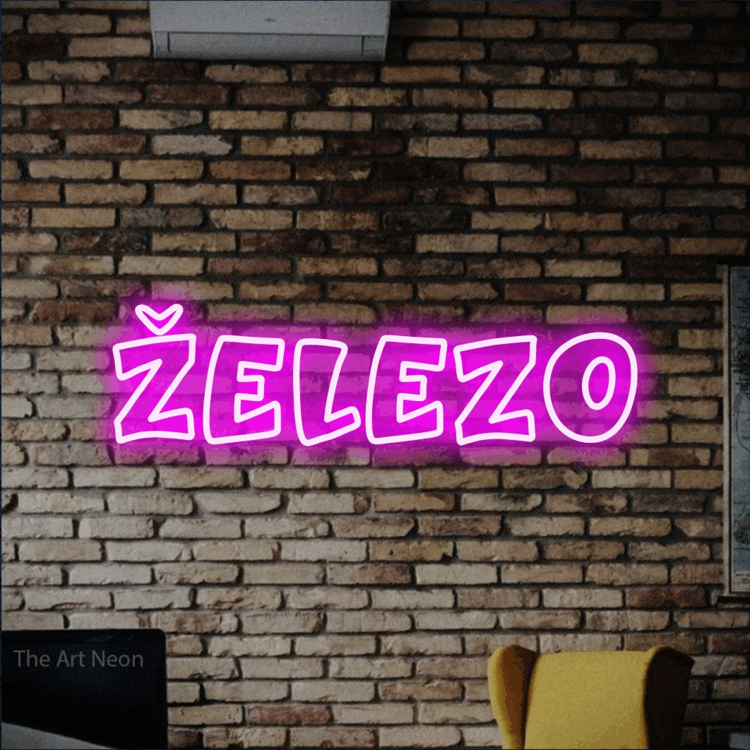 LED neon sign reading “ŽELEZO”, arranged in a single line.