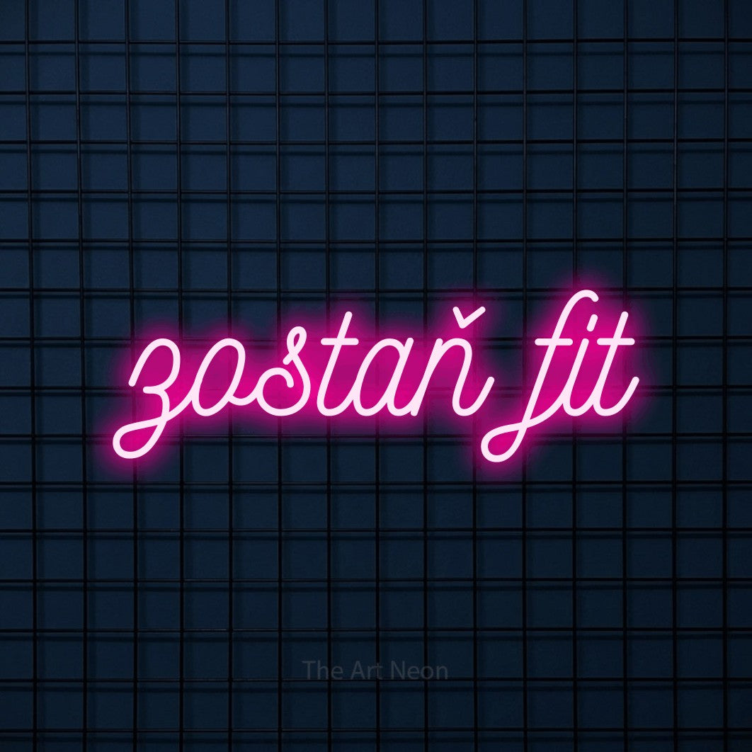 LED neon sign reading “zostaň fit”, arranged in a single line.
