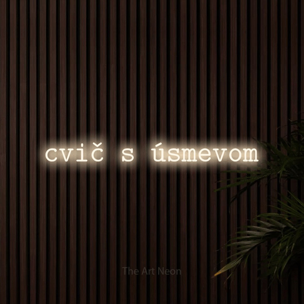 LED neon sign reading “cvič s úsmevom”, arranged in a single line.