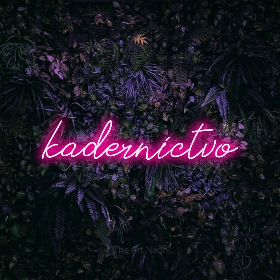 LED neon sign reading “kaderníctvo”, arranged in a single line.