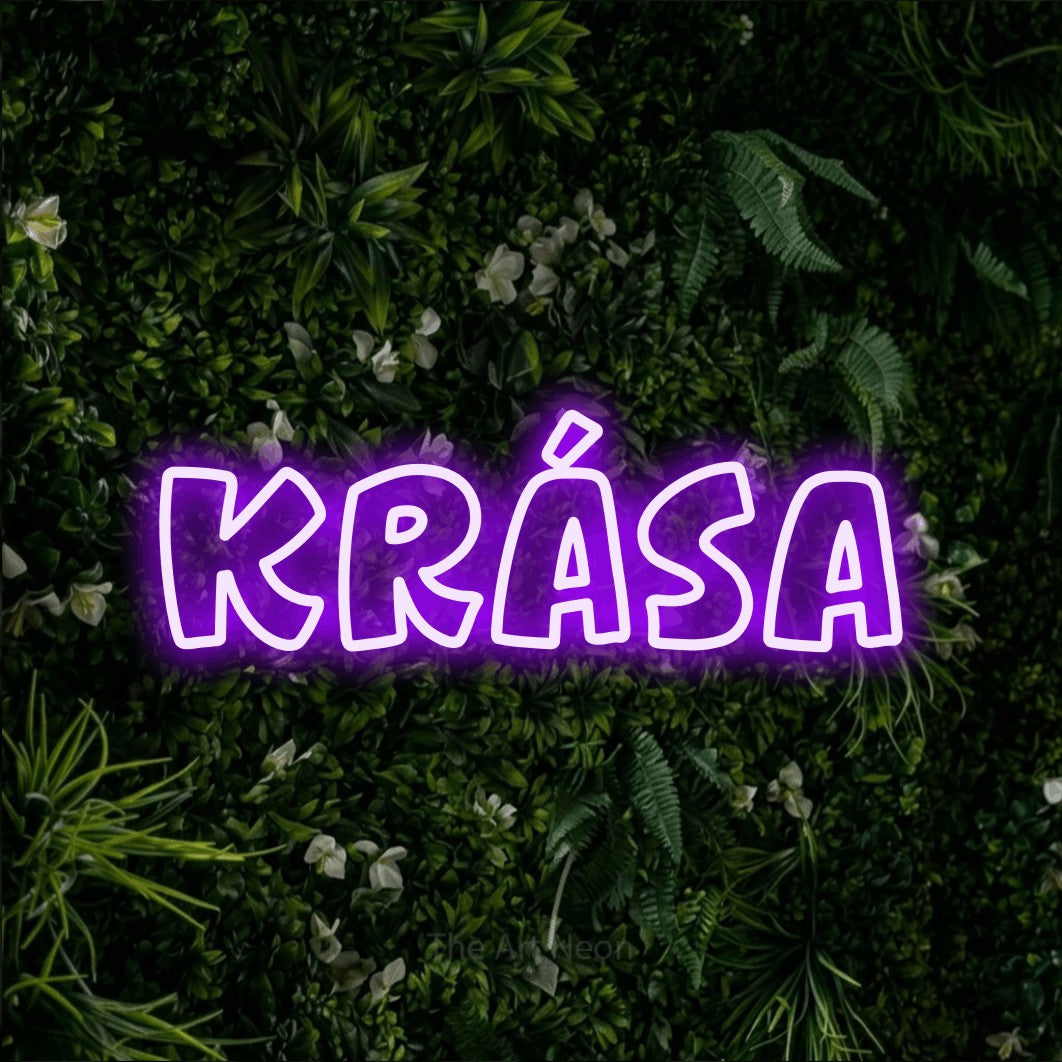 LED neon sign reading “Krása”, arranged in a single line.