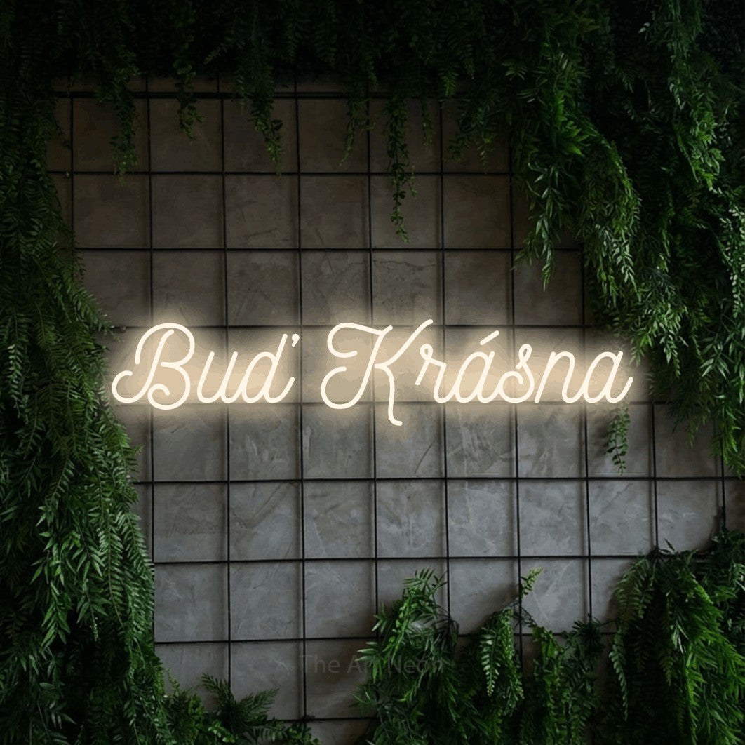 LED neon sign reading “Buď Krásna”, arranged in a single line.