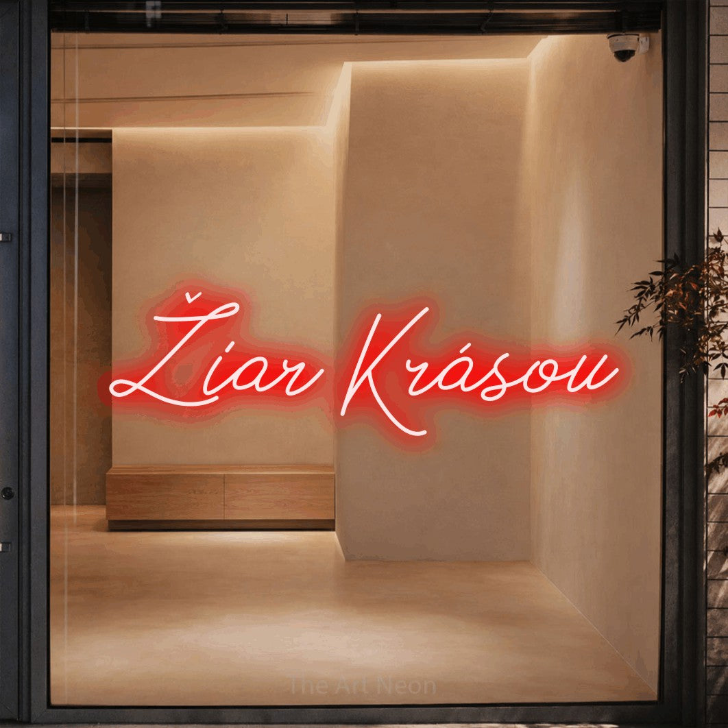 LED neon sign reading “Žiar Krásou”, arranged in a single line.