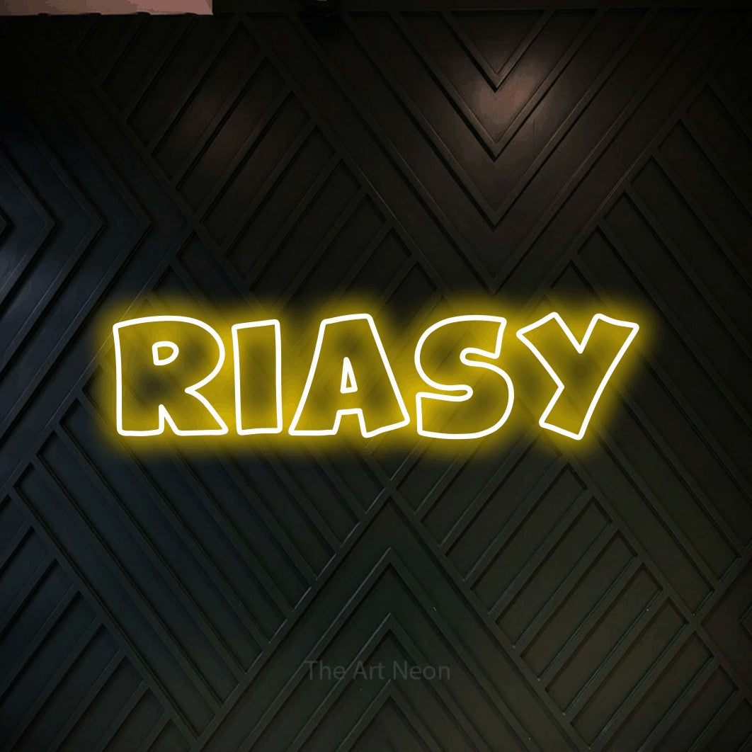 LED neon sign reading “RIASY”, arranged in a single line.