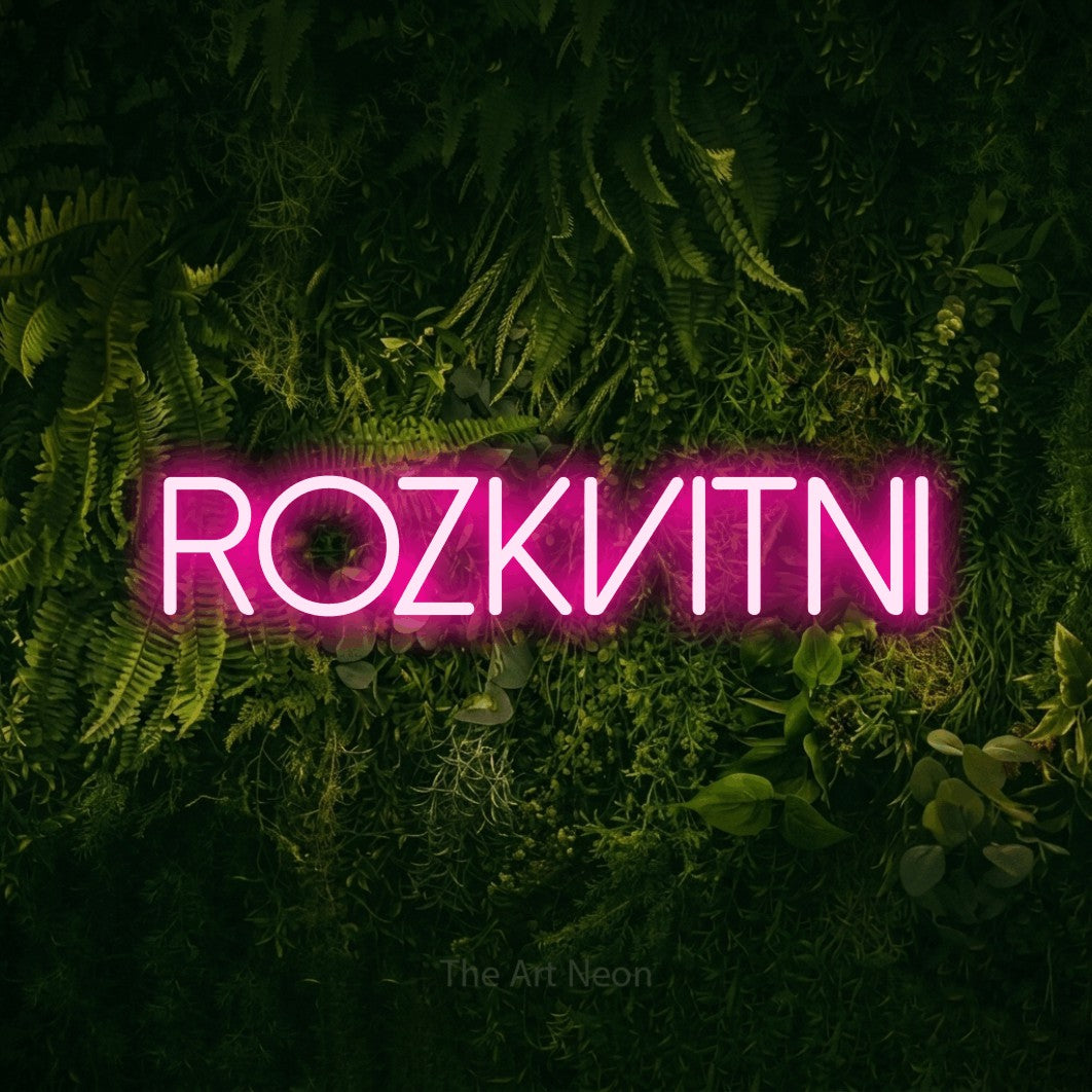 LED neon sign reading “rozkvitni”, arranged in a single line.