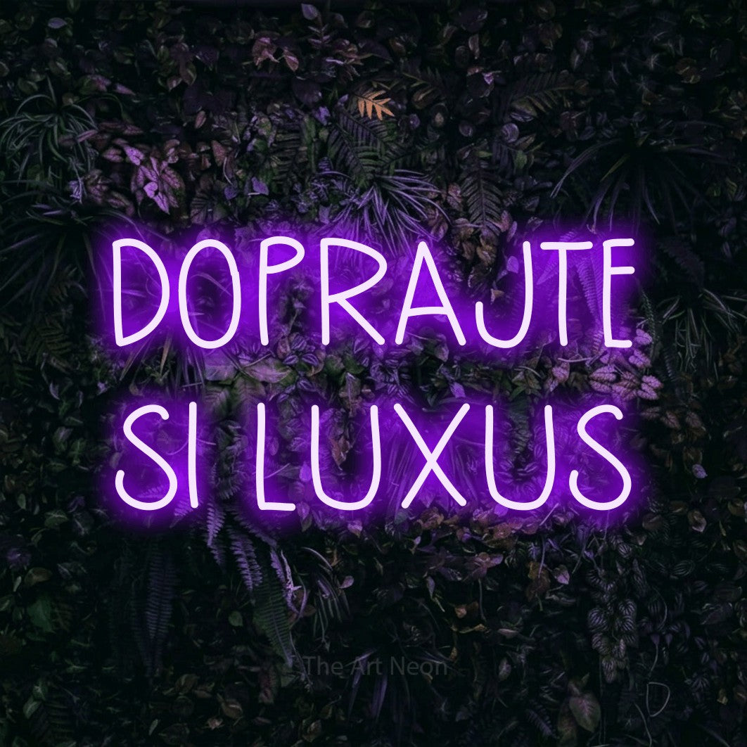 LED neon sign reading “DOPRAJTE SI LUXUS”, arranged in two lines.