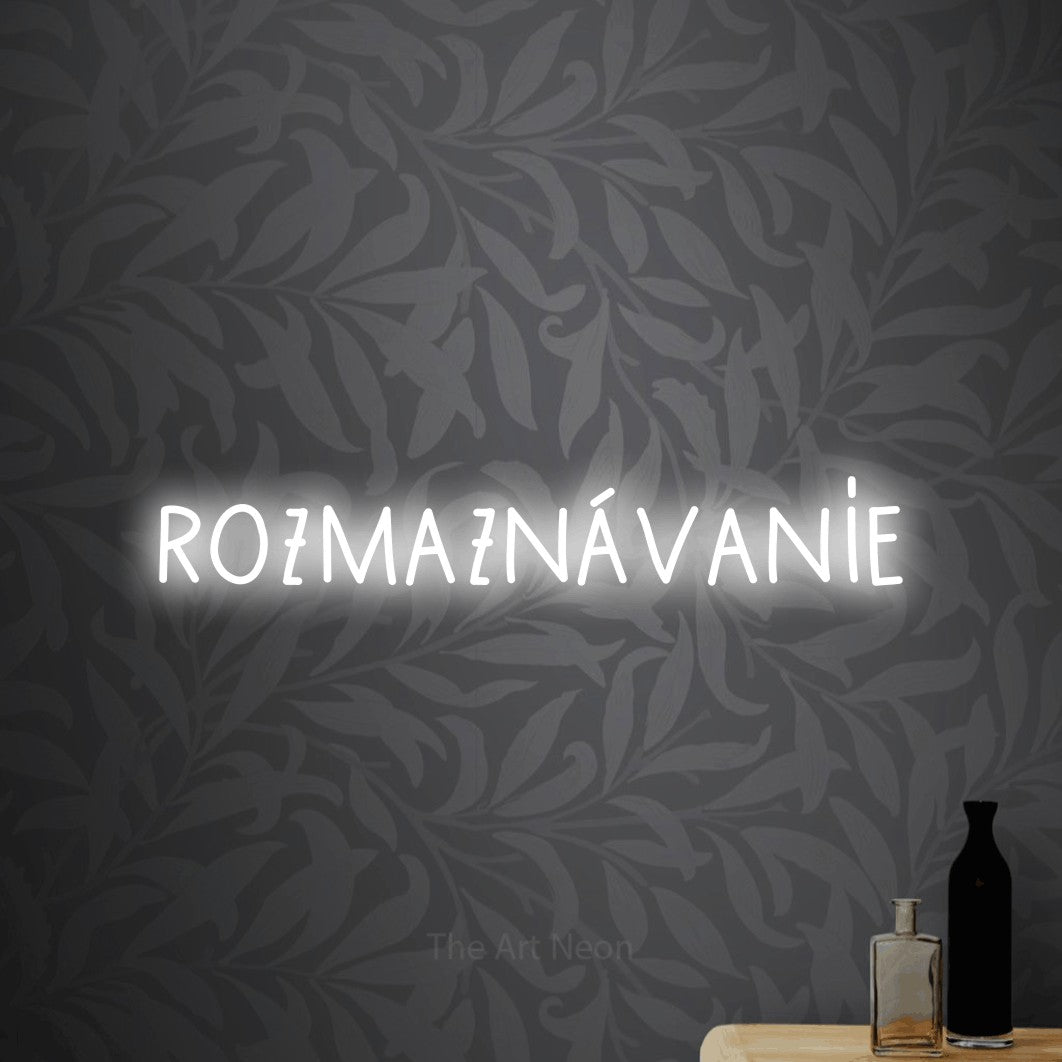 LED neon sign reading “rozmaznávanie”, arranged in a single line.