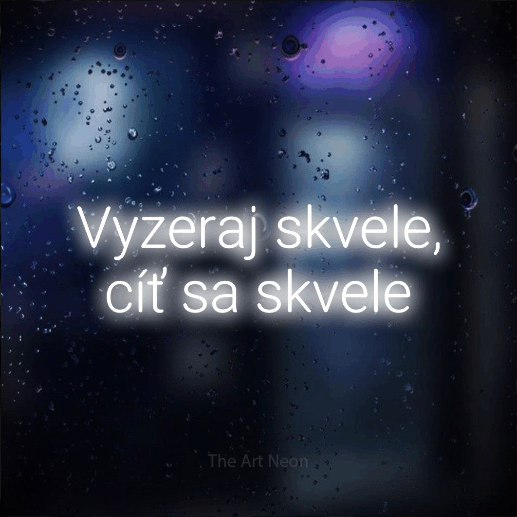 LED neon sign reading “Vyzeraj skvele, cíť sa skvele”, arranged in two lines.