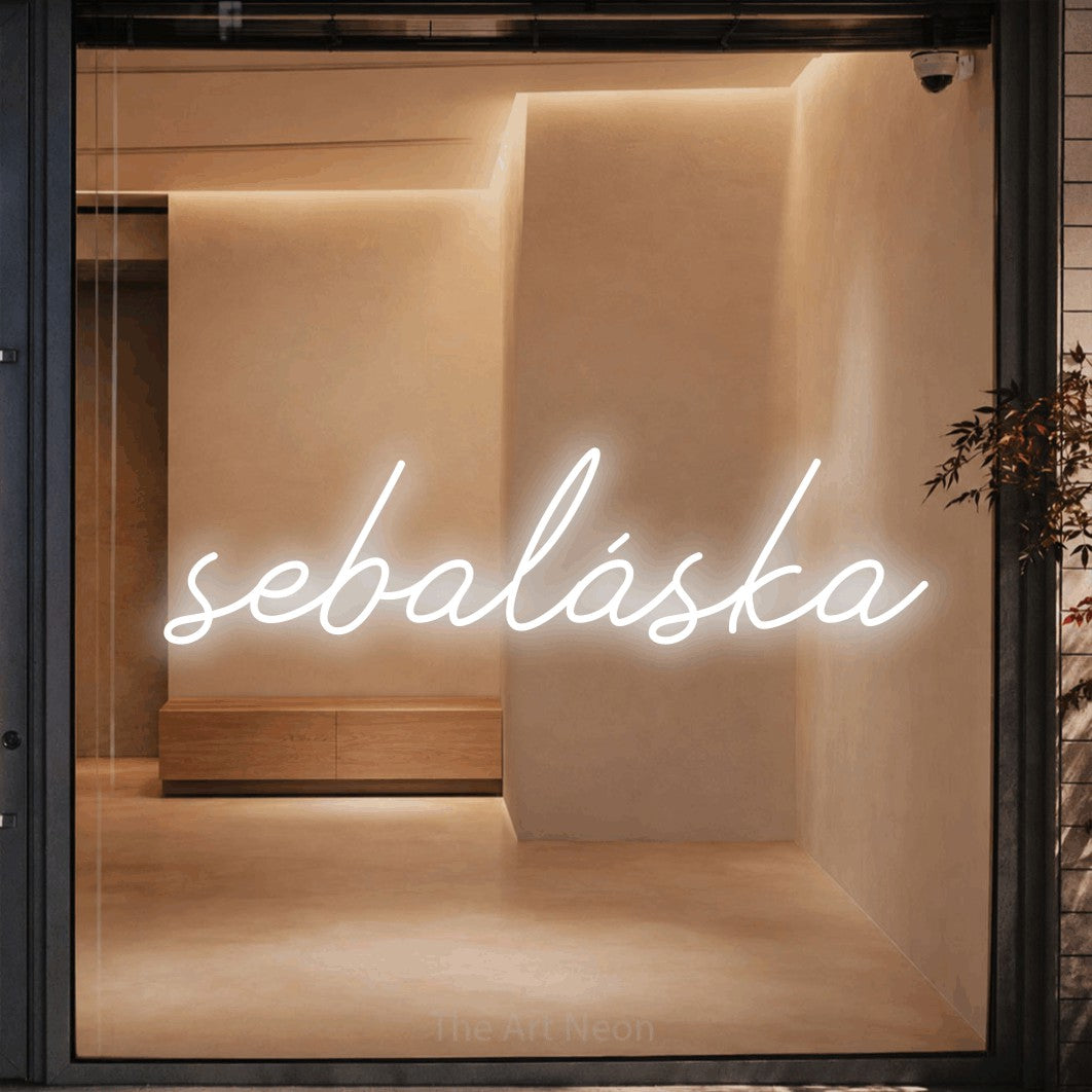 LED neon sign reading “sebaláska”, arranged in a single line.