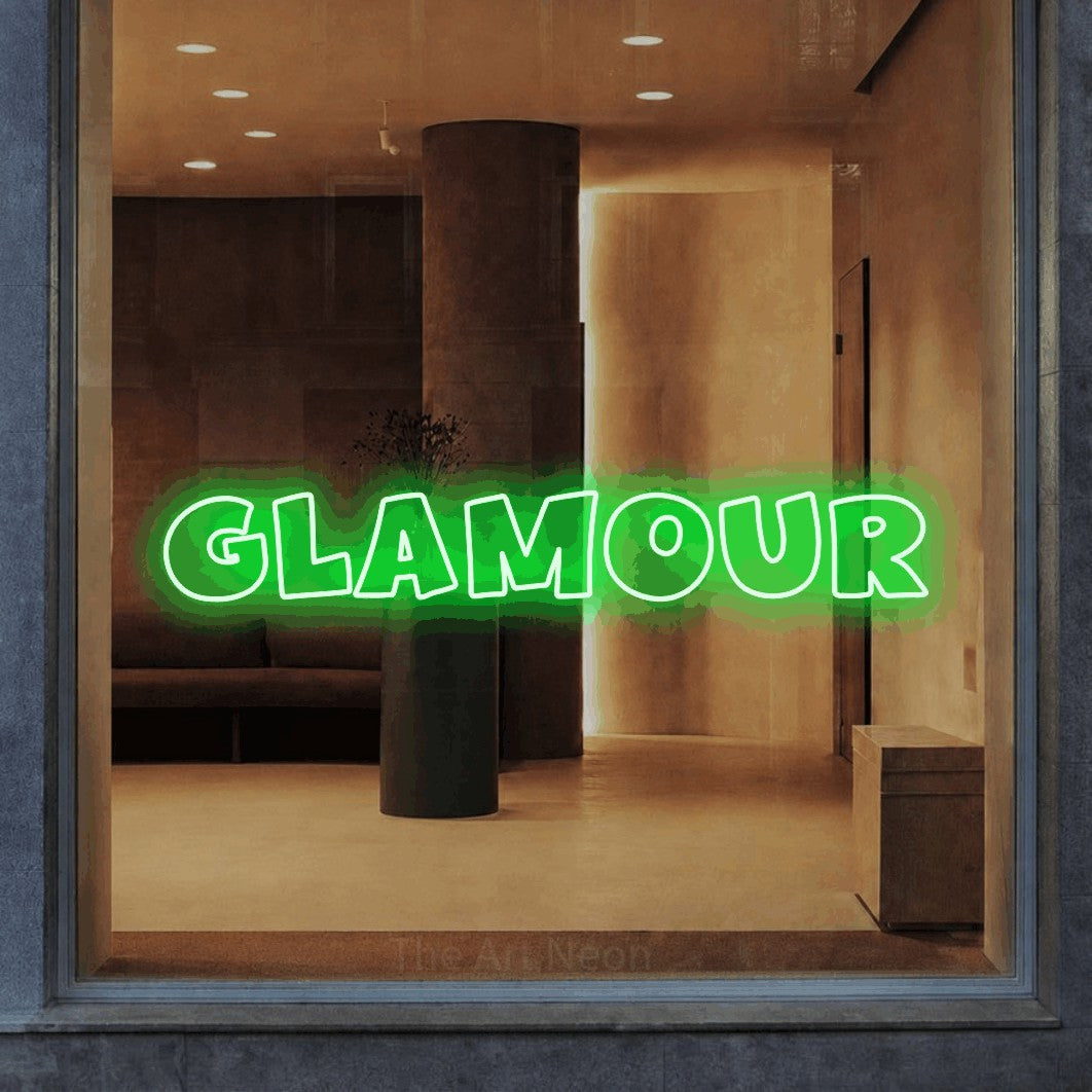 LED neon sign reading “GLAMOUR”, arranged in a single line.