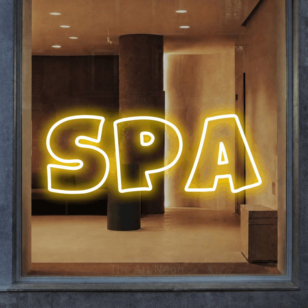 LED neon sign reading “spa”, arranged in a single line.