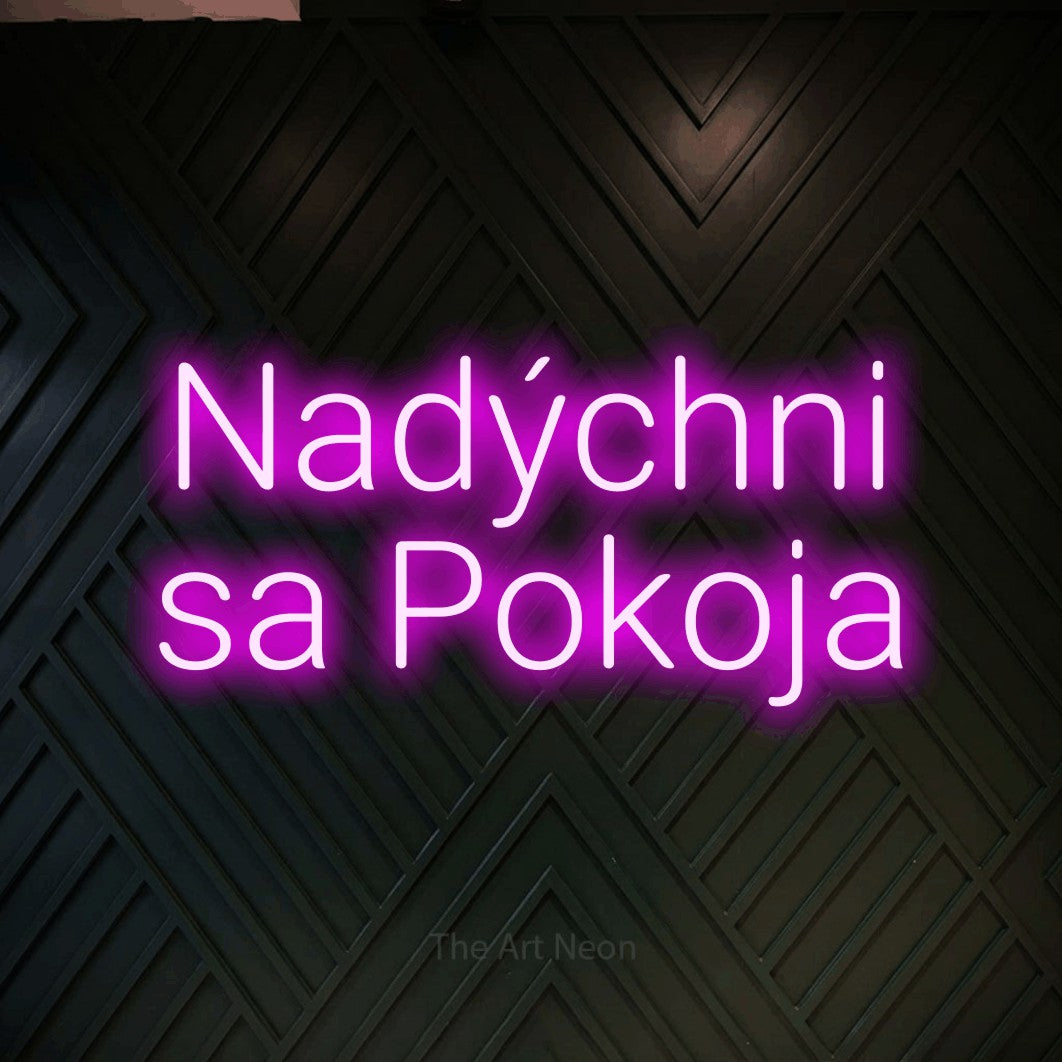 LED neon sign reading “Nadýchni sa Pokoja”, arranged in two lines.
