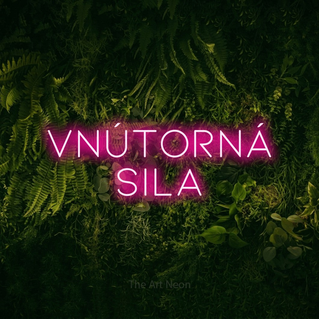 LED neon sign reading “vnútorná sila”, arranged in two lines.