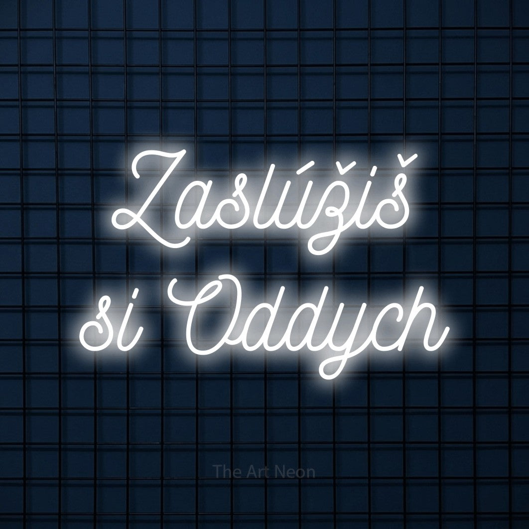 LED neon sign reading “Zaslúžiš si Oddych”, arranged in two lines.