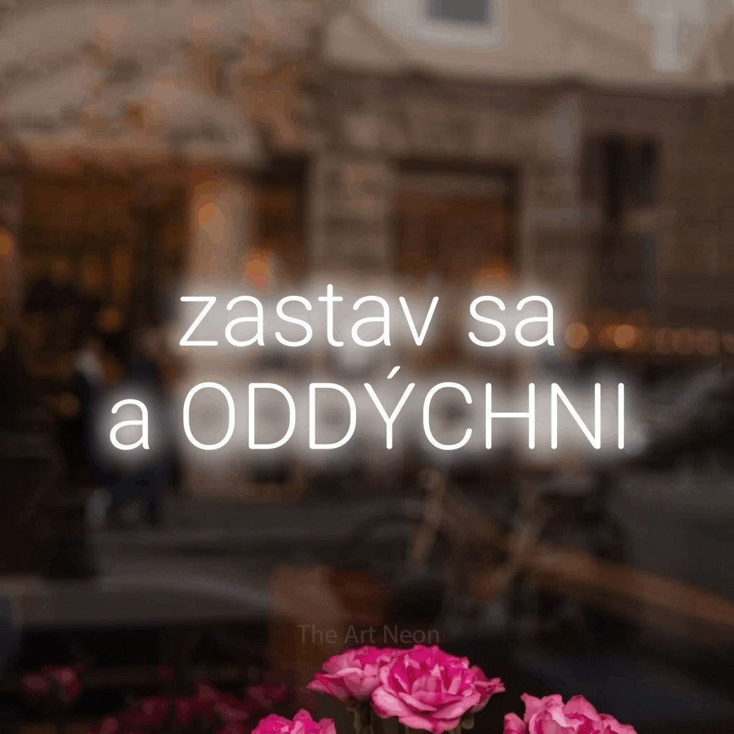 LED neon sign reading “zastav sa a ODDÝCHNI”, arranged in two lines.